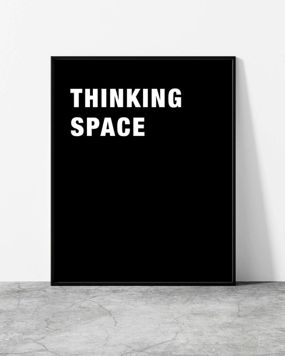 Minimalist black and white typography print with bold text reading 'THINKING SPACE' in uppercase letters.