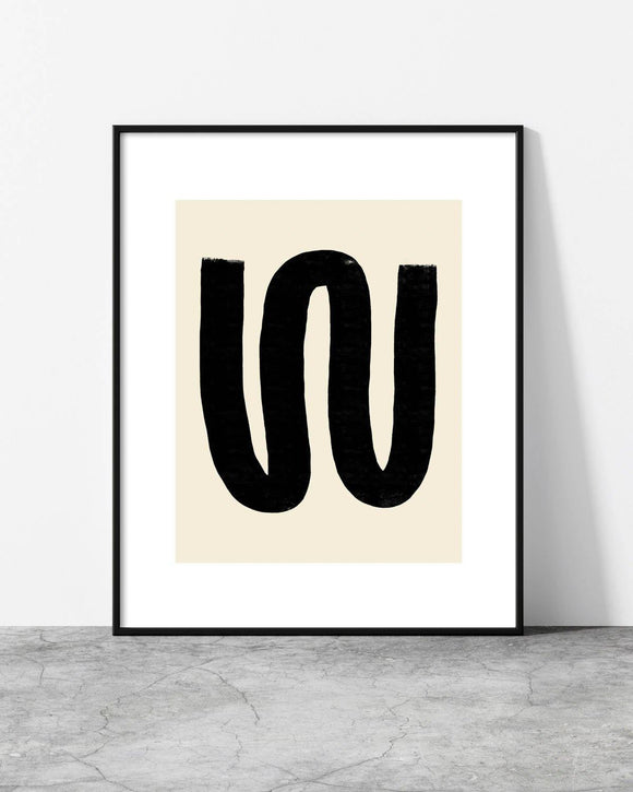 Contemporary wall art showcasing a fluid black organic form against a neutral beige canvas.
