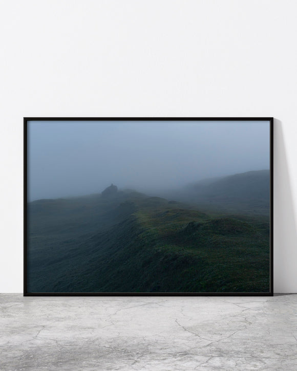 Moody landscape print of a stone cairn on misty blue-grey moorland at dawn on the Fanal highlands, Madeira