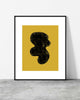 Minimalist abstract art print featuring an organic black shape with textured details on a mustard yellow background.