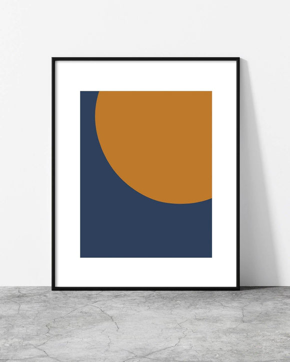 Contemporary geometric wall art with a curved golden shape contrasting a dark blue canvas.