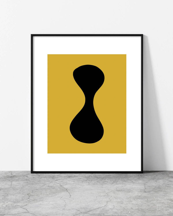 Stylish abstract print showcasing a fluid black silhouette on a golden-yellow backdrop.